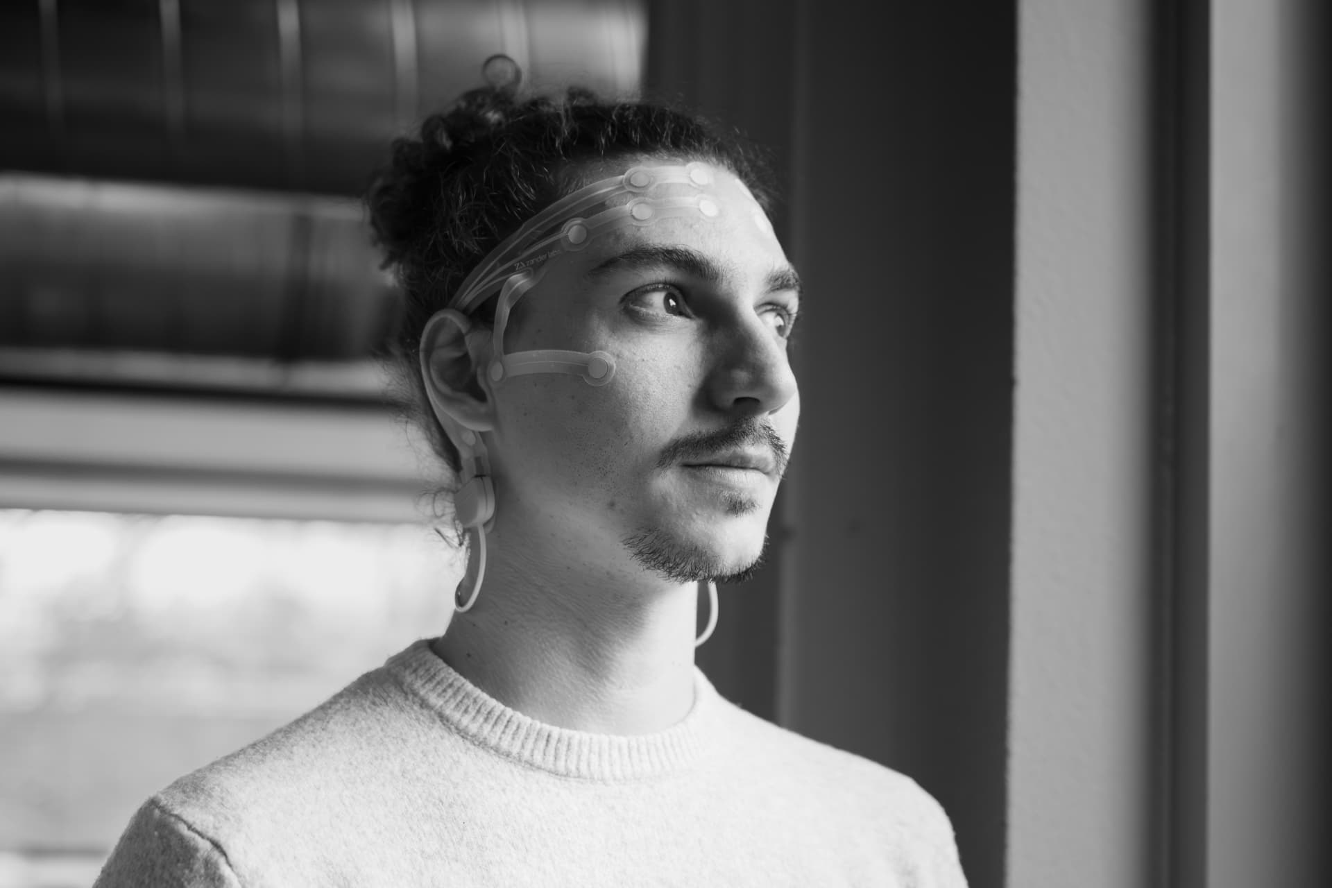 A person wearing the Zypher EEG headset